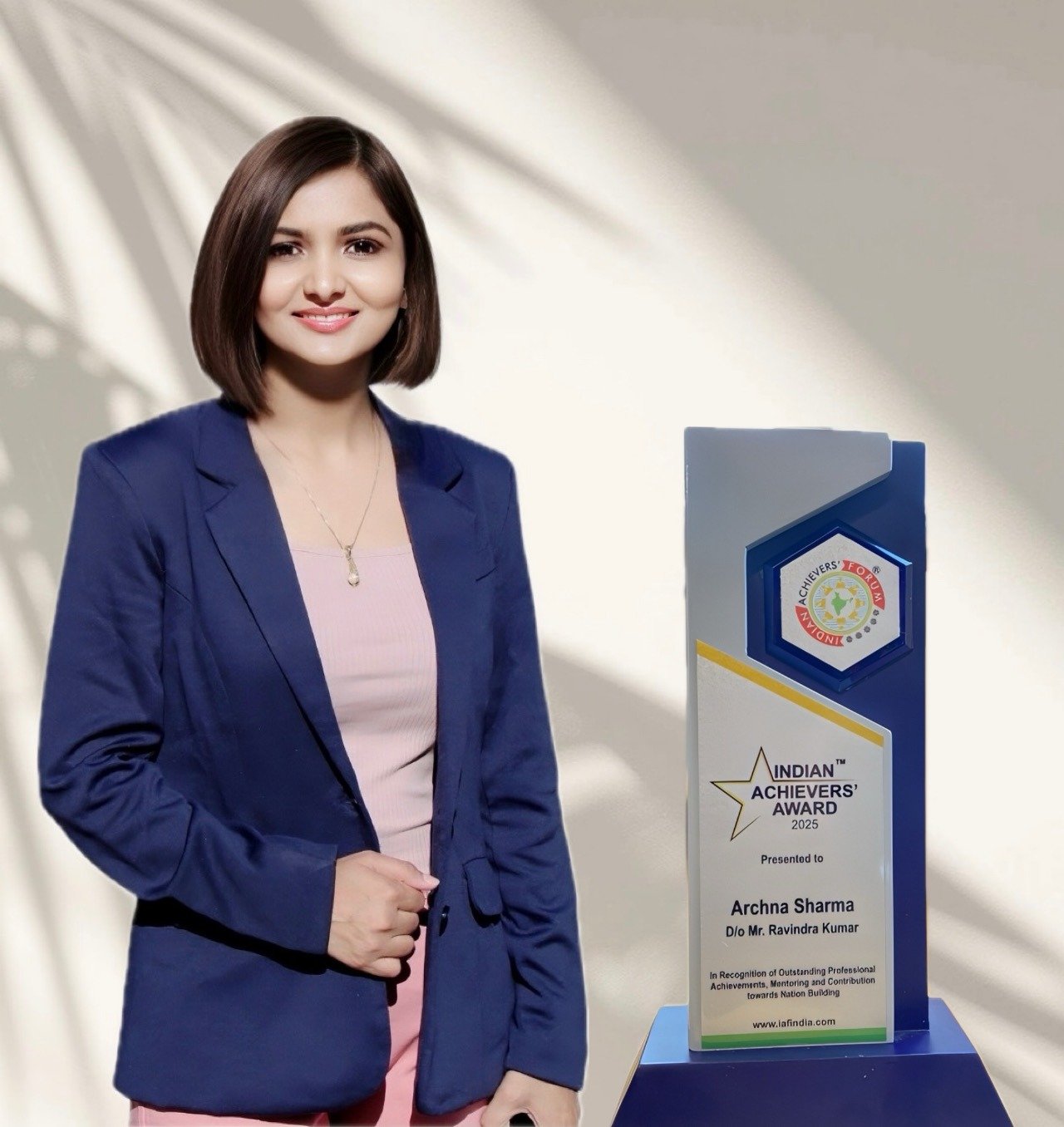Archana with trophy