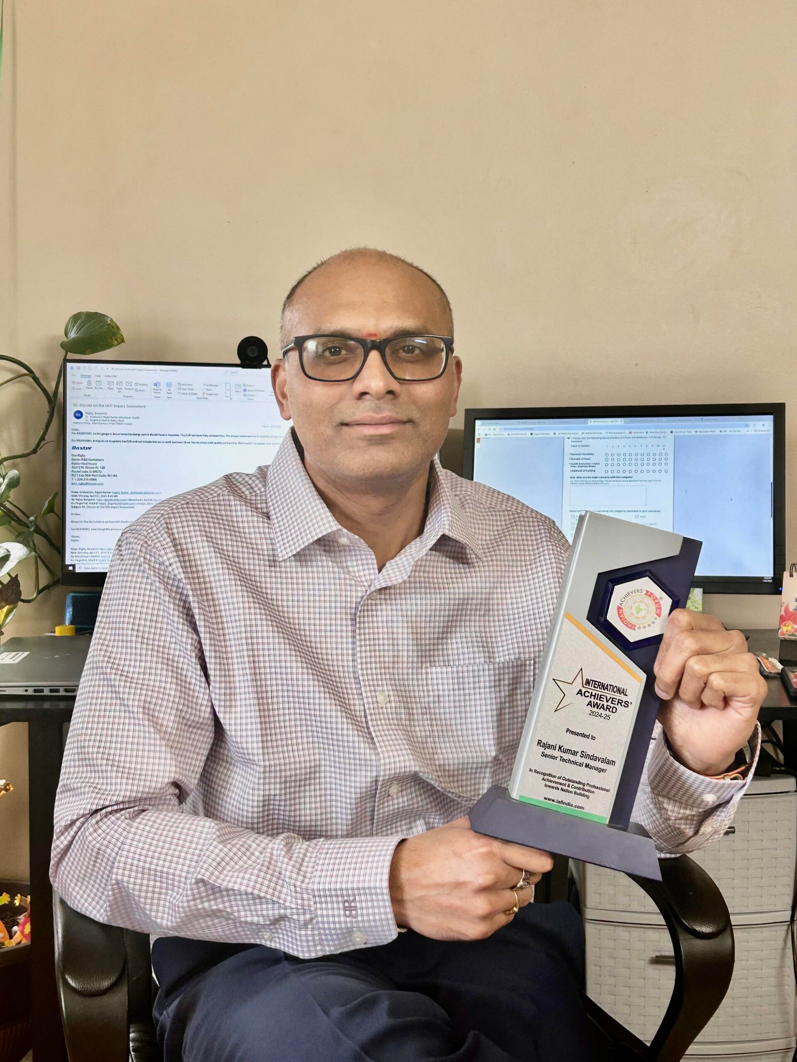 Rajani with Award