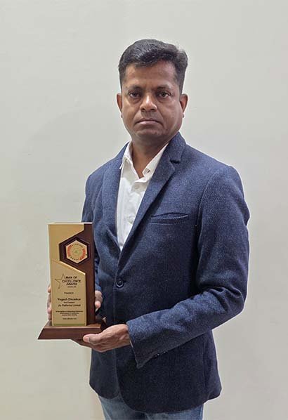 Mr. yogesh dhomkar with trophy